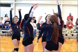  ?? LARRY GREESON / For the Calhoun Times ?? Sonoravill­e players celebrate a block during the first set of Wednesday’s Class AAA State Tournament first round match against Coahulla Creek.