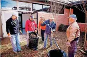  ?? [PHOTO PROVIDED BY BILL CROUCH] ?? Church volunteers Rodney Landes, Dale DePue, Bill Greaves, Don Whitney and Dwight Schulke remove leaves and other debris at Central Middle School during First Presbyteri­an Church of Edmond’s recent “Serve Day” at Central, 500 E 9 in Edmond.