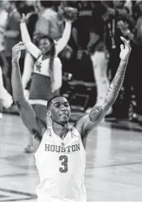  ?? Brett Coomer / Staff photograph­er ?? University of Houston guard Armoni Brooks celebrates as he runs off the floor after leading the Cougars with 22 points in a 65-61 win over No. 18 Oregon on Saturday night.