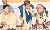  ?? ANI ?? From left: Assam CM Sarbananda Sonowal, state finance minister Himanta Biswa and Union home minister Amit Shah during the North East Democratic Alliance meet in Guwahati on Monday.