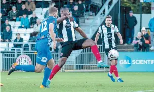  ?? ?? Emile Acquah stretches to score against Eastleigh. Photo: Darren Woolley.