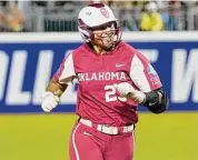  ?? Sue Ogrocki/Associated Press ?? Oklahoma’s Tiare Jennings runs during the first game of the NCAA Women’s College World Series softball championsh­ip series against Texas on June 8 in Oklahoma City.