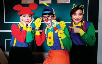  ?? — Bernama photo ?? Jiji, Rara and Cacha often opt for the Auguste clown character as it is more cheerful and approachab­le, especially for children.
