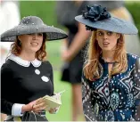  ?? REUTERS ?? Prince Andrew reportedly wants Princesses Eugenie, left, and Beatrice to carry out royal duties fulltime.