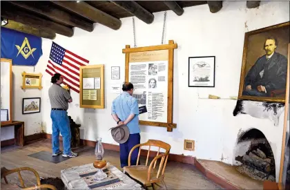  ?? File photo ?? Visitors explore the parlor of the Kit Carson Home &amp; Museum in Taos on Thursday. The museum draws about 20,000 visitors annually.