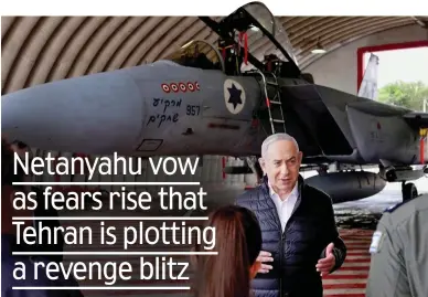  ?? ?? Fighting talk: Israeli premier Benjamin Netanyahu at an F-15 air force base yesterday