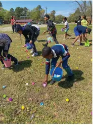  ?? (Special to the Commercial) ?? New Life Church of Pine Bluff partnered with other community churches to hold an Easter Egg Hunt on Easter Sunday, one year after covid-19 forced the church to suspend in-person services and celebrate Easter virtually.