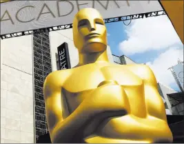  ??  ?? The Associated Press file In addition to a new Oscar category to honor popular films, the Academy of Motion Picture Arts and Sciences is promising to trim the award ceremony to three hours.