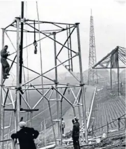  ??  ?? Top: Crowds packed into Dens in 1953 to see their beloved Dark Blues in action; above: Floodlight­s installati­on work in 1959; opposite page: Dens heroes Alan Gilzean and Claudio Caniggia.