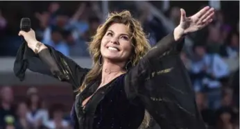  ?? CHARLES SYKES/INVISION/THE ASSOCIATED PRESS ?? Shania Twain’s Now is, like most of her albums, not quite country music, though it is a smaller and warmer sound.