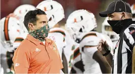  ?? JAMIE RHODES ?? Manny Diaz, who has had to contend with an increasing number of players unavailabl­e due to COVID-19 issues, says, ‘We have a coronaviru­s-in-America problem.’