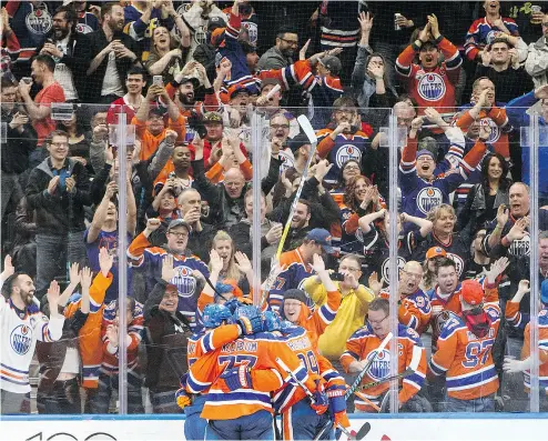  ?? JASON FRANSON / THE CANADIAN PRESS ?? Oilers fans have some postseason celebratin­g to look forward to — and they’re hoping for more scenes like this one from the Oilers- Ducks game April 1.