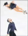  ?? AP PHOTO/JULIE JACOBSON ?? Meagan Duhamel and Eric Radford of Canada perform in the pair figure skating short program in the Gangneung Ice Arena at the 2018 Winter Olympics in Gangneung, South Korea, Wednesday.