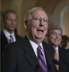  ?? J. SCOTT APPLEWHITE — THE ASSOCIATED PRESS ?? In this file photo, Senate Majority Leader Mitch McConnell of Ky., flanked by Sen. John Thune, R-S.D., the Republican Conference chairman, left, and Sen. Roy Blunt, R-Mo., meets with reporters on Capitol Hill Washington.