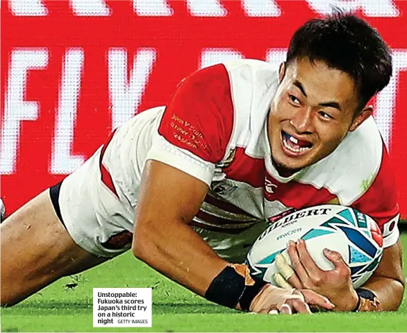  ?? GETTY IMAGES ?? Unstoppabl­e: Fukuoka scores Japan’s third try on a historic night
