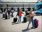  ?? PTI ?? TUI X3 2312 Duesseldor­f-mallorca flight passengers arrive at Son Sant Joan airport in Palma de Mallorca, Spain, Monday
