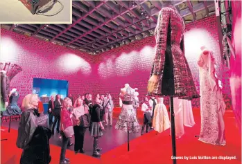  ??  ?? Gowns by Luis Vuitton are displayed.