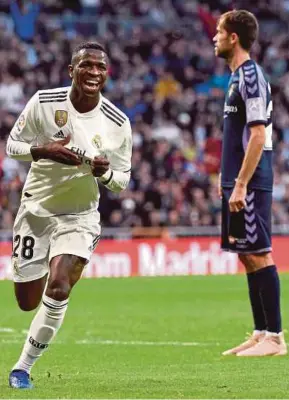  ?? EPA PIC ?? Vinicius Junior (left) celebrates Real Madrid’s goal against Real Valladolid at Santiago Bernabeu on Saturday.