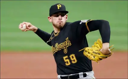  ?? AP Photo/Ron Schwane ?? In this Sept. 26 file photo, Pittsburgh Pirates starting pitcher Joe Musgrove delivers against the Cleveland Indians during the first inning of a baseball game in Cleveland.