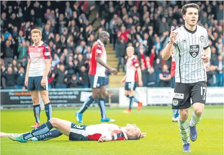  ?? Pictures: SNS Group, ?? Lewis Morgan celebrates St Mirren’s fifth goal to leave Raith Rovers’ players crestfalle­n.