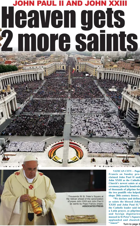  ?? ASSOCIATED PRESS ?? Thousands fill St. Peter’s Square at the Vatican ahead of the canonizati­on of popes John XXIII and John Paul II
as saints by Pope Francis (inset).