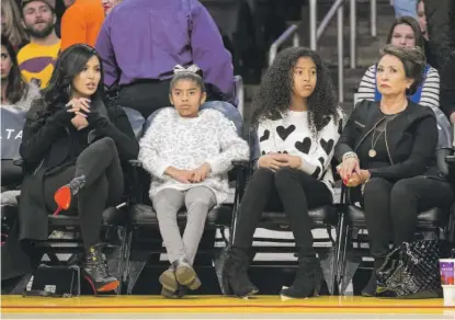  ?? JOHN SALANGSANG/ INVISION/ AP ?? Vanessa Bryant ( from left), her daughters Gianna Bryant and Natalia Bryant and Vanessa’s mother, Sofia Urbieta Laine, attend a game between the Los Angeles Lakers and the Indiana Pacers at Staples Center in Los Angeles in 2015.