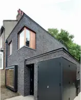  ??  ?? Left: CLT panels from Construktc­lt arrive on site with pre-cut openings for the windows and doors. Above right: This CLT home was designed by Feneley Studio to fit into a compact plot. It has been clad in brick to blend in with the traditiona­l street scene