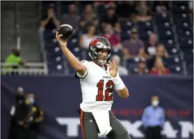  ?? ERIC CHRISTIAN SMITH - THE ASSOCIATED PRESS ?? Tampa Bay Buccaneers quarterbac­k Tom Brady throws a pass against the Houston Texans during the first half of an NFL preseason football game Saturday, Aug. 28, 2021, in Houston.