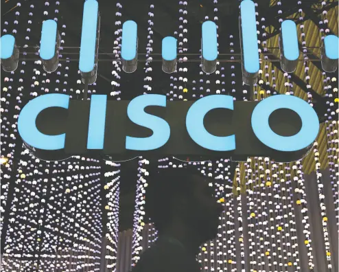  ?? Sergio Perez / reuters files ?? Once the largest public company in the world, Cisco lost over 80 per cent of its value when it crashed.