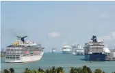  ?? LYNNE SLADKY/AP 2020 ?? Four major members of the Cruise Line Internatio­nal Associatio­n have committed to drastic emissions cuts. Above, cruise ships in Miami.
