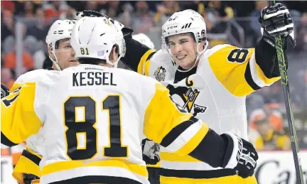  ?? DERIK HAMILTON/THE ASSOCIATED PRESS/FILES ?? Pittsburgh Penguins captain Sidney Crosby and other stars have said they want to go to the 2018 Winter Olympics, but haven’t said they’d leave their NHL teams to do so.