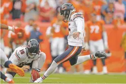  ?? DAVID ZALUBOWSKI/ASSOCIATED PRESS ?? Bears kicker Eddy Pineiro nails the game-winning field goal against the Broncos on Sunday in Denver. The Bears won 16-14.