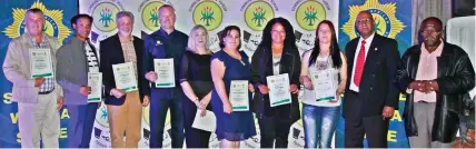  ??  ?? With Major-General Oswald Reddy (second right) are the members of the George CPF and neighbourh­ood watches that were awarded: André Olivier, André Pieterse, Gert Nothnagel, Charles Newham, Llani Newham, Liana van der Rijst, Theresa Buys, Anzelle Fourie and CPF chairman, Isaac Dikgachi (far right).