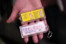  ?? Photograph: Graeme Robertson/The Guardian ?? A promotiona­l Durex keyring from 1992.