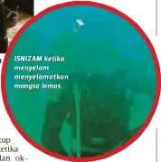  ??  ?? ISNIZAM ketika melakukan operasi SAR di Tebingan Kuching. ISN I Z AM ke ti ka m e nye l a m m e nye l a m a t ka n mangsa lemas.