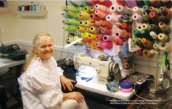  ??  ?? Rita Dasciorien­e works on her sewing machine in the Alteration­s by Rita shop on Kelly Road in Fort Myers.