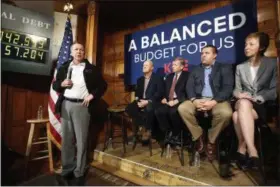  ?? JIM COLE — THE ASSOCIATED PRESS FILE ?? Ohio Gov. John Kasich, a Republican presidenti­al candidate, speaks during a balanced budget discussion with business leaders in Manchester, N.H. As the U.S. national debt ticks toward $20 trillion, Kasich says he is not abandoning his goal of a federal...