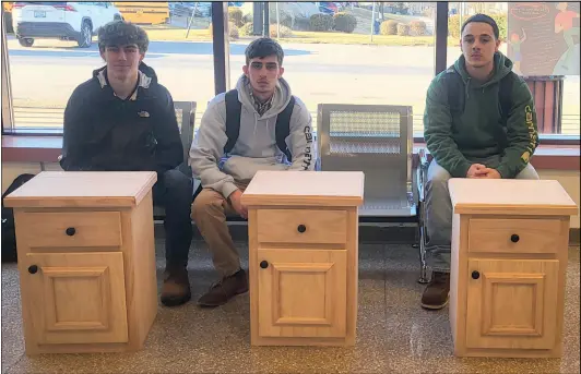  ?? Submitted photo ?? Keagan Gormley, Michael Totten and Nathan Charbonnea­u, seniors in the Facilities, Operations and Management pathway at West Warwick High School, each earned a medal in the cabinetmak­ing category at the SkillsUSA Rhode Island Championsh­ip Competitio­n�