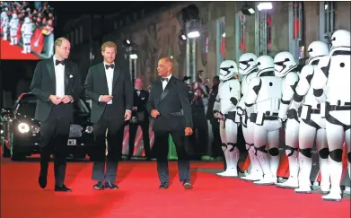  ?? HANNAH MCKAY / REUTERS ?? British princes William and Harry arrive for the European premiere of Star Wars: The Last Jedi at the Royal Albert Hall in London on Tuesday.