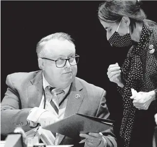  ?? BOB BROWN/ASSOCIATED PRESS ?? State Sen. John Bell, D-Loudoun, left, confers with Sen. Jennifer Boysko, D-Fairfax during the floor session of the Virginia Senate in Richmond last Tuesday.