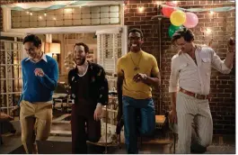  ??  ?? Jim Parsons (from left), Robin De Jesus, Michael Benjamin Washington and Andrew Rannells kick up their heels in a scene from the remade “The Boys in the Band.” (Netflix via AP/ Scott Everett White)