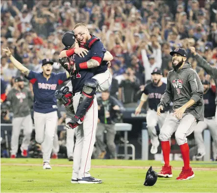  ?? JAE C. HONG/THE ASSOCIATED PRESS ?? The Boston Red Sox won Game 5 over the Dodgers 5-1 on Sunday in L.A. to clinch the World Series.