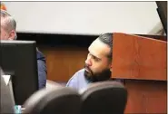  ?? ?? Sebastian Parra looks over at the court clerk who read that the jury found him guilty of murdering and attempting to rob Benny Alcala Jr.