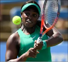  ??  ?? Sloane Stephens returns the ball against Andrea Petkovic, of Germany, during the Citi Open tennis tournament, on Wednesday, in Washington.
AP PhoTo/nICk WAss