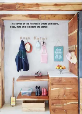  ??  ?? This corner of the kitchen is where gumboots, bags, hats and raincoats are stored.