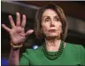  ?? ZACH GIBSON — GETTY IMAGES ?? House Speaker Nancy Pelosi portrays the impeachmen­t inquiry battle as a struggle to preserve the Constituti­on’s balance of power against a president who has asserted that Article II allows him to ignore the will of Congress.