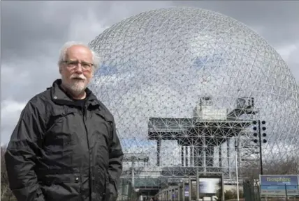  ?? PAUL CHIASSON, THE CANADIAN PRESS ?? Roger La Roche in front of the Biosphere, the former United States pavilion at Expo 67, on Monday.