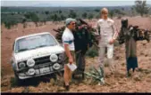  ??  ?? Fraternisi­ng with the locals: this was Ari, co-driver Atso Aho and STW 202R, preparing to start the 1977 Safari.
