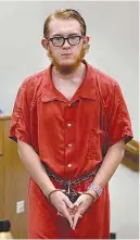  ?? Associated Press ?? Defendant Tyerell Przybycien of Spanish Fork, Utah, returns to court Aug. 23 after a break during his preliminar­y hearing in 4th District Court in Provo. A judge was considerin­g Wednesday whether Przybycien, an 18-year-old accused of filming the...