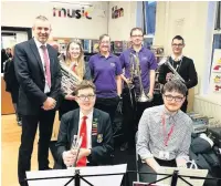  ??  ?? ●● Haslingden High School Brass Band performed at Haslingden Library